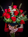 red rose flower bouquet wrapped in burlap from The Flower Cart