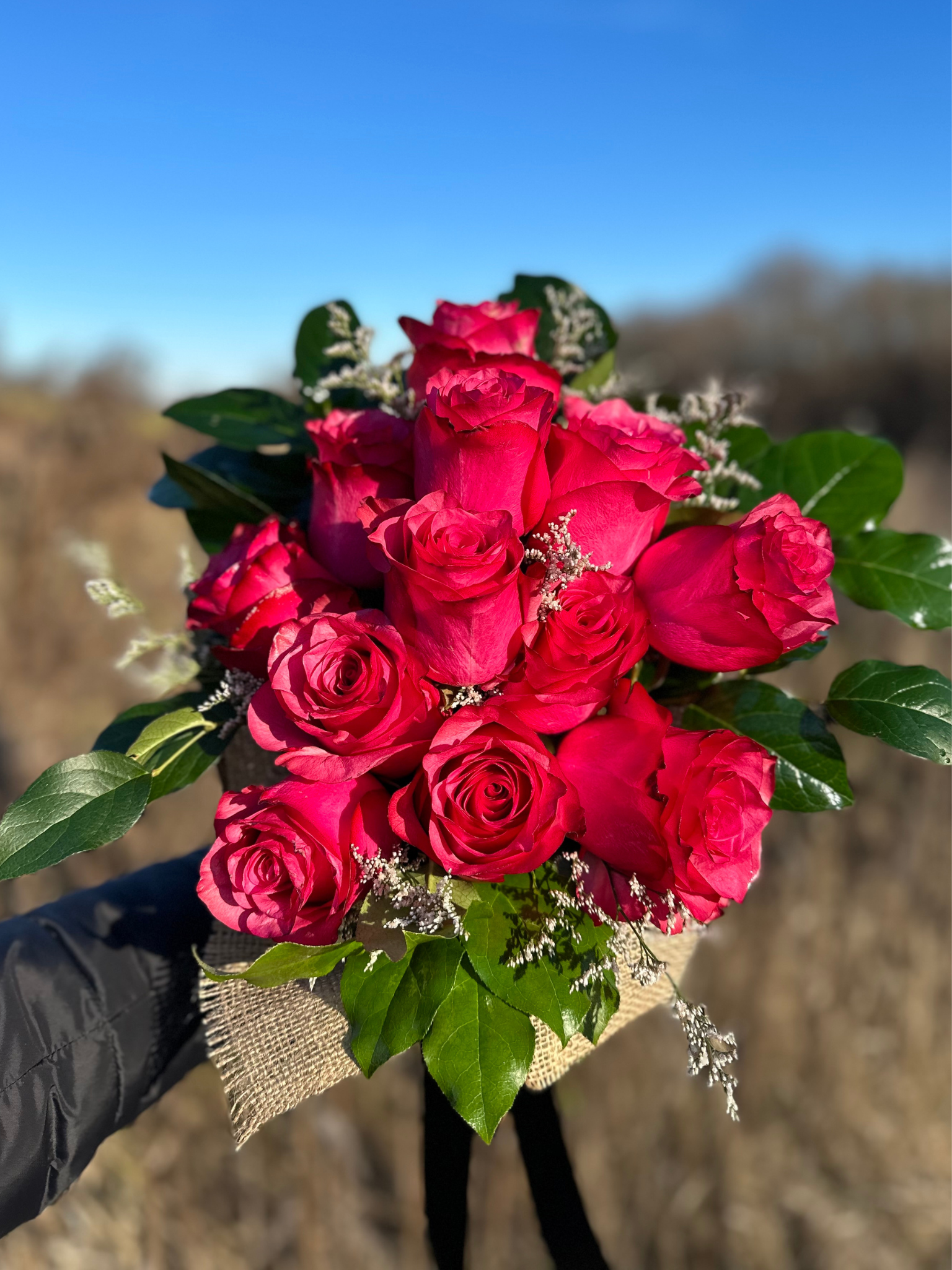 hot pink rose flower bouquet wrapped in burlap from The Flower Cart in Baltimore, MD